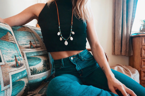 Suede necklace, cowrie shells, beaded aventurine, on model