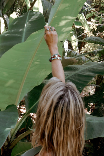 3 silver accented beaded bracelets, on model