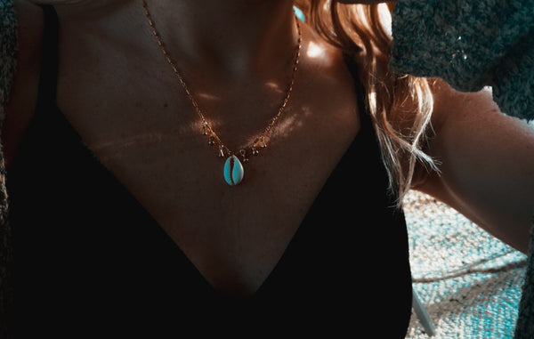 Gold Candied Cowrie necklace, on model