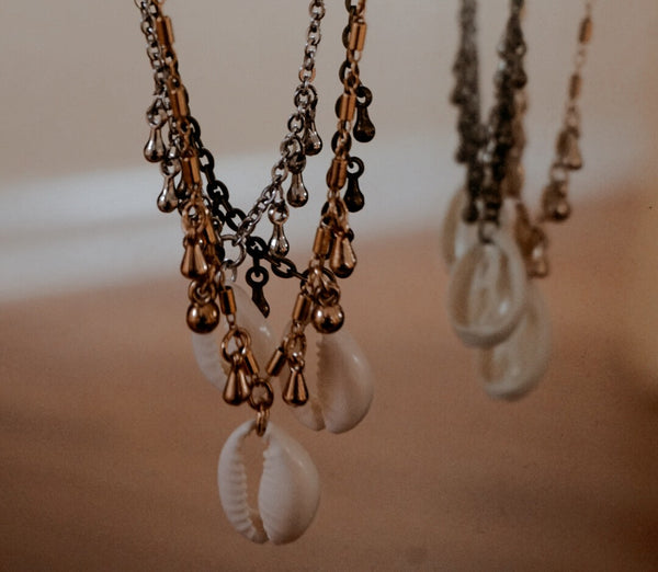 Variety of Candied Cowrie shell necklace, bronze, gold and silver, product image