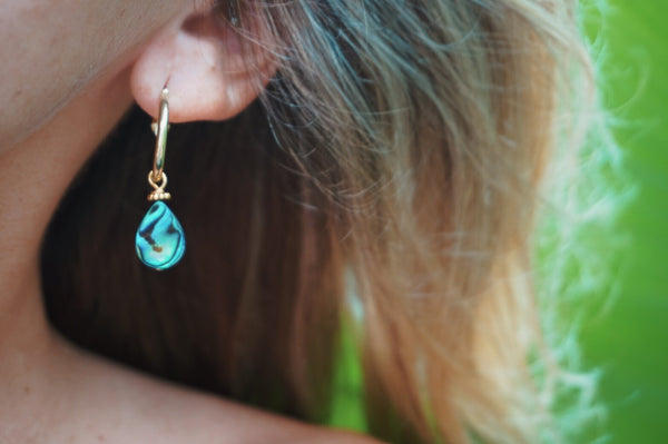 gold, mini hoop earrings, accented with abalone, on model