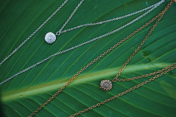 two layered necklaces, one silver accented, other bronze accented, product image