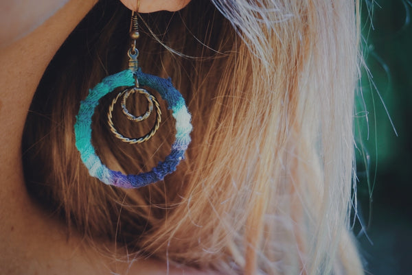 tie dye fabric wrapped hoop earrings, mini bronze accents, on model