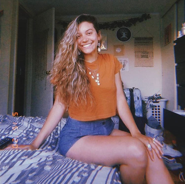 cascading cowrie necklace, on model