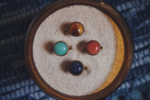 variety of semiprecious stone rings, bronze, adjustable base, aventurine, tigers eye, gold sandstone, blue sandstone, rings