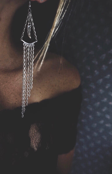 silver, statement earrings, chain, gradually falling, on model