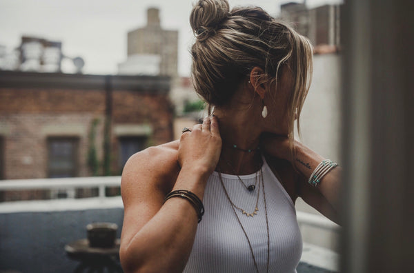 stretchy, bronze and silver tube bar bracelet stacks, on model