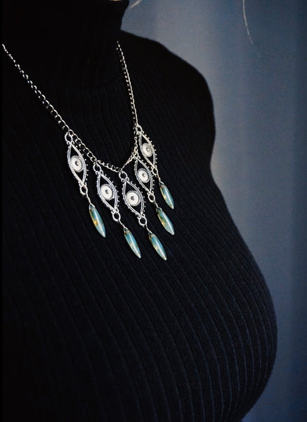 silver eyes with turquoise picasso beads, necklace on model
