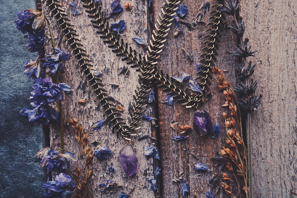 bronze, fish bone chain with raw amethyst drop necklaces, flat lay, product image