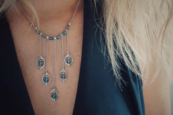 silver statement necklace, light blue crystals gradually falling