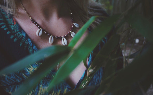 beaded cowrie shell necklace, product on model