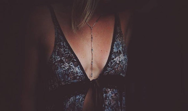 silver, rosary style, Y necklace, light blue crystals, on model