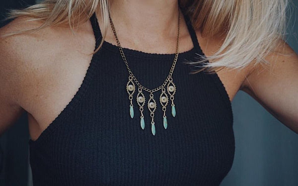 bronze eyes with turquoise picasso beads, necklace on model