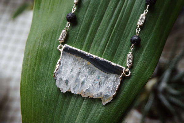 Deep cut amethyst slice, lava rock beads & silver accents, product image