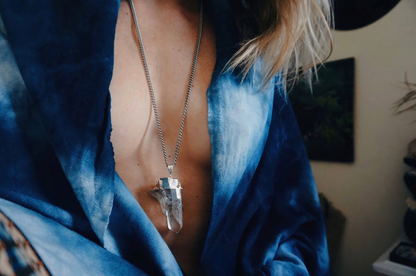 large, clear quartz pedant necklace, on model