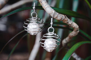 silver wire orb earrings with pearl inside, product image