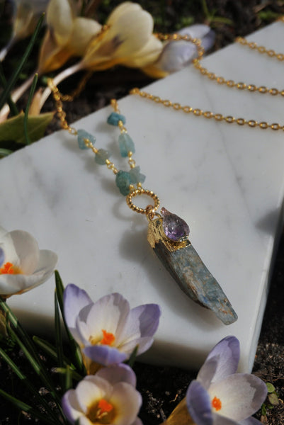 long gold necklace with raw blue kyanite shard pendant, product image