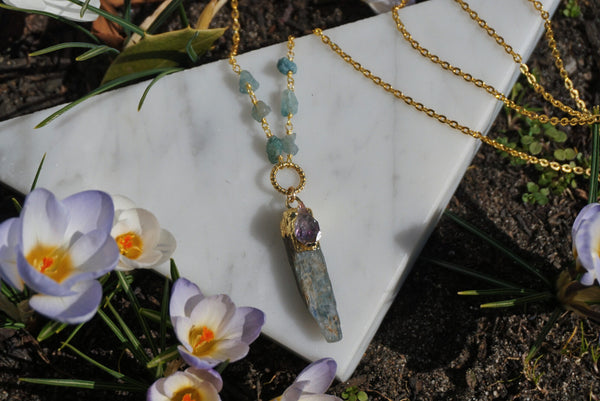 long gold necklace with raw blue kyanite shard pendant, product image