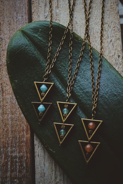 variety of bronze, beaded triangle, necklaces, product image