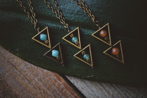 variety of bronze, beaded triangle, necklaces, product image