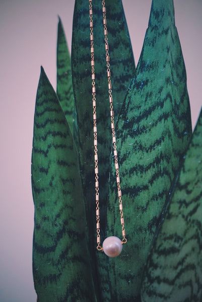 single pearl held by gold filled chain, product image